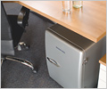 A Waeco Mobicool F38 Mini Fridge is a neat addition to any office.
